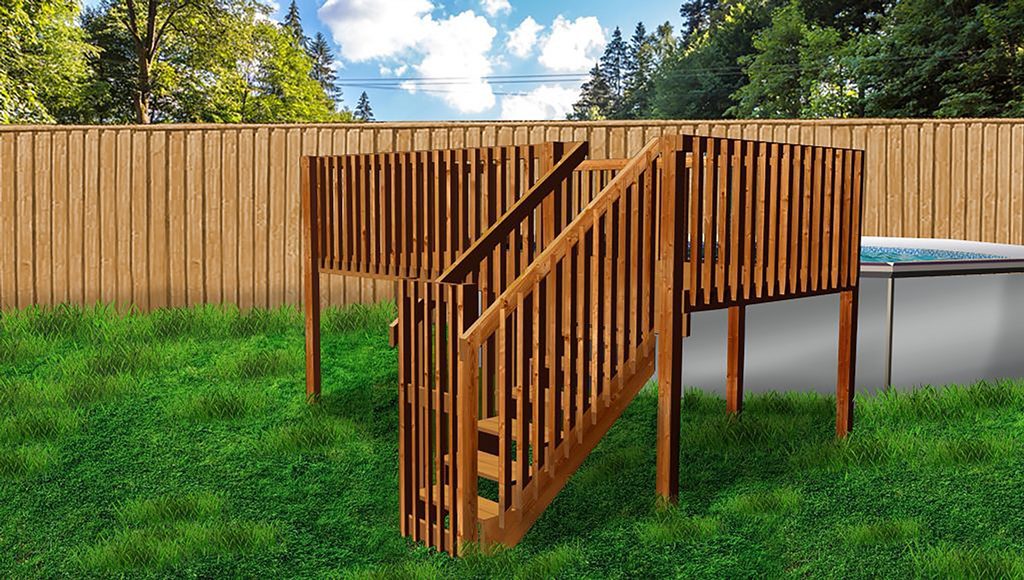 A wooden fence with stairs going up it