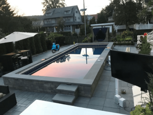 A pool with a tv on top of it